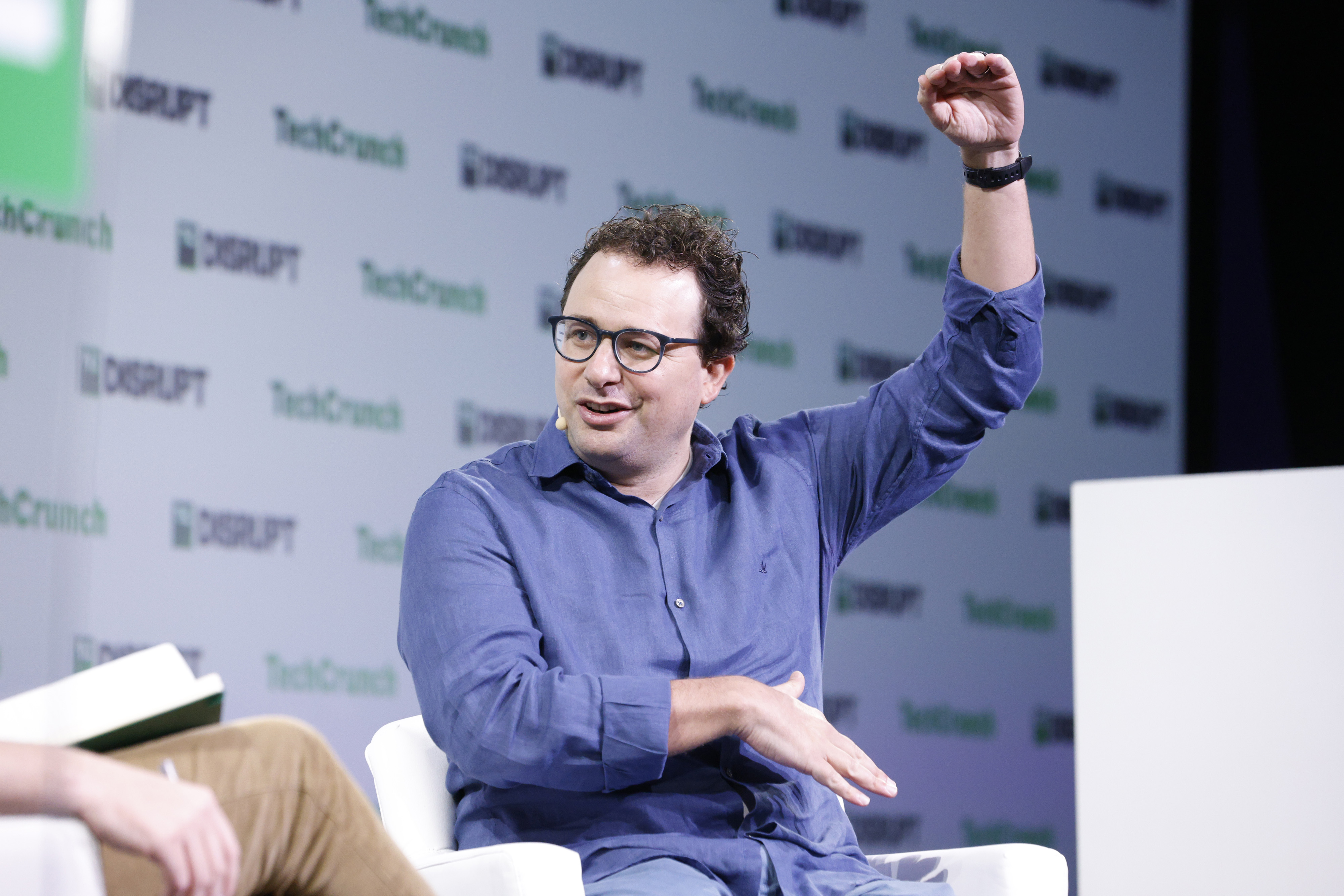 Anthropic CEO Dario Amodei speaking onstage at TechCrunch Disrupt 2023 — Anthropic cut internet access for all internal Claude evaluations
