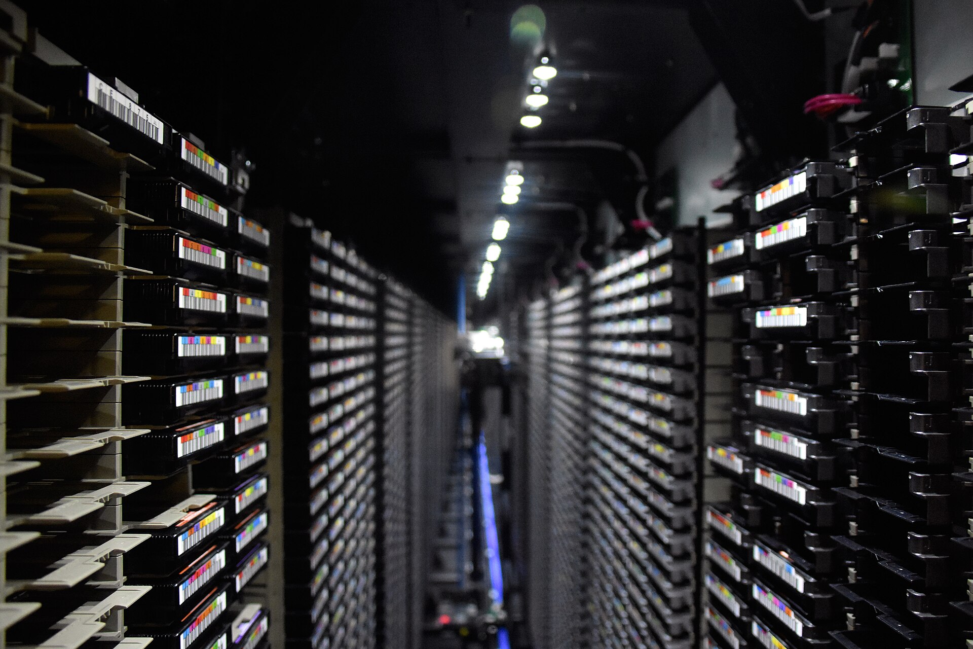 Data centre storage racks in a corridor, the kind of facility at issue in the Anthropic Osaka data centre talks