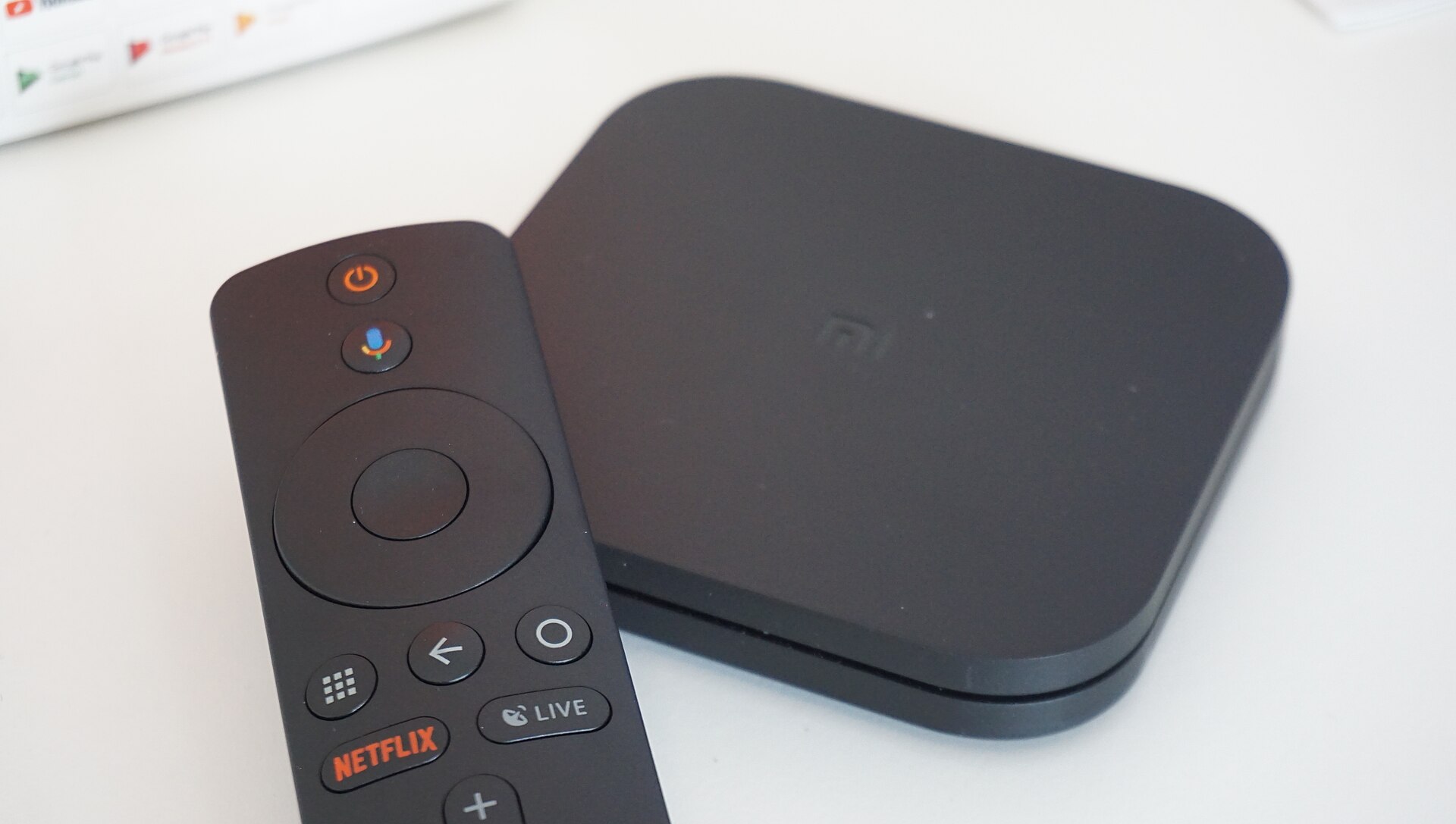 An Android TV streaming box and remote, the kind of cheap home device tested for self-replicating AI worms IoT