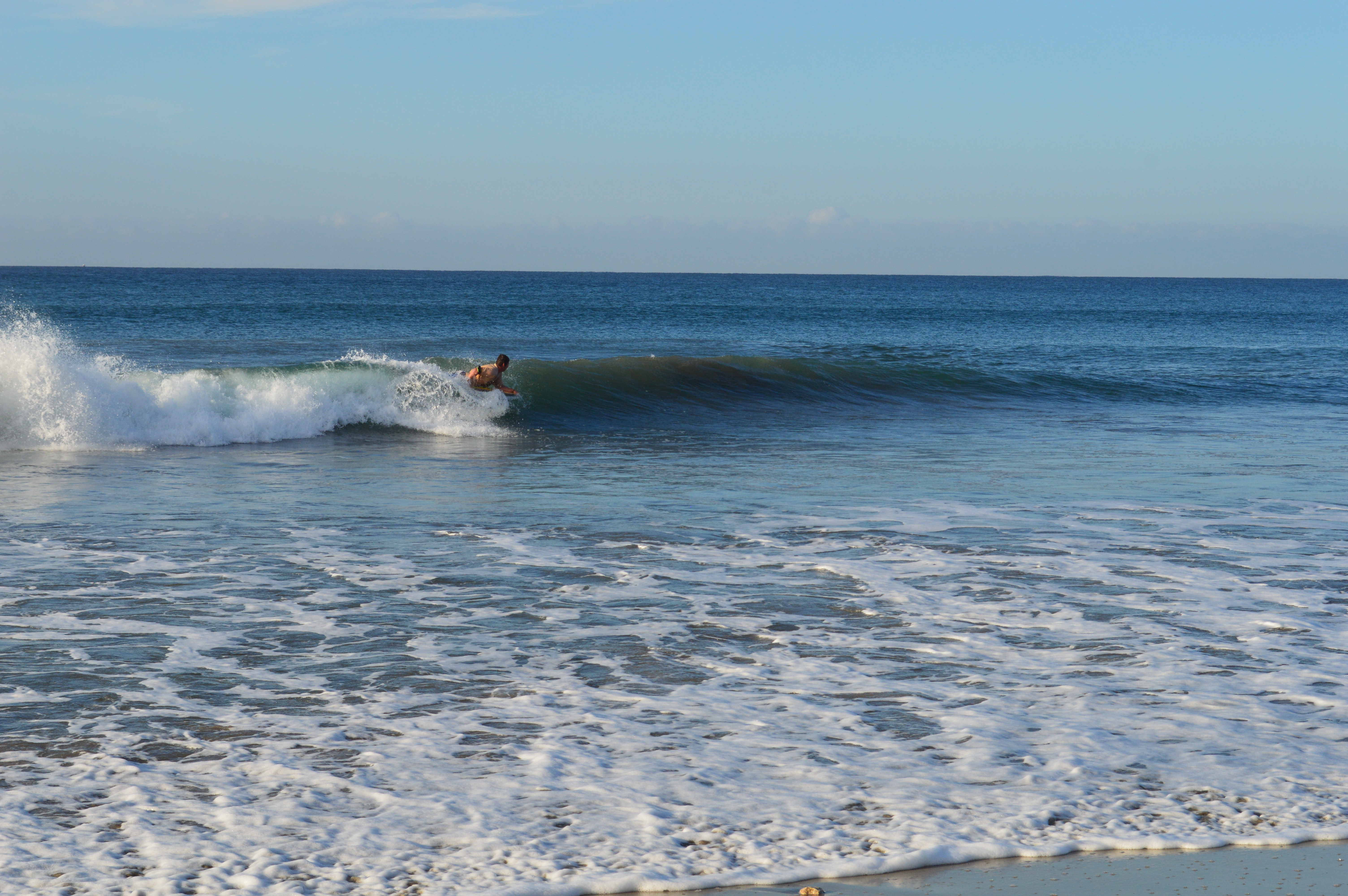 Surfer riding a wave in Baja California, where Jake and Callum Robinson and Carter Rhoad traveled in 2024