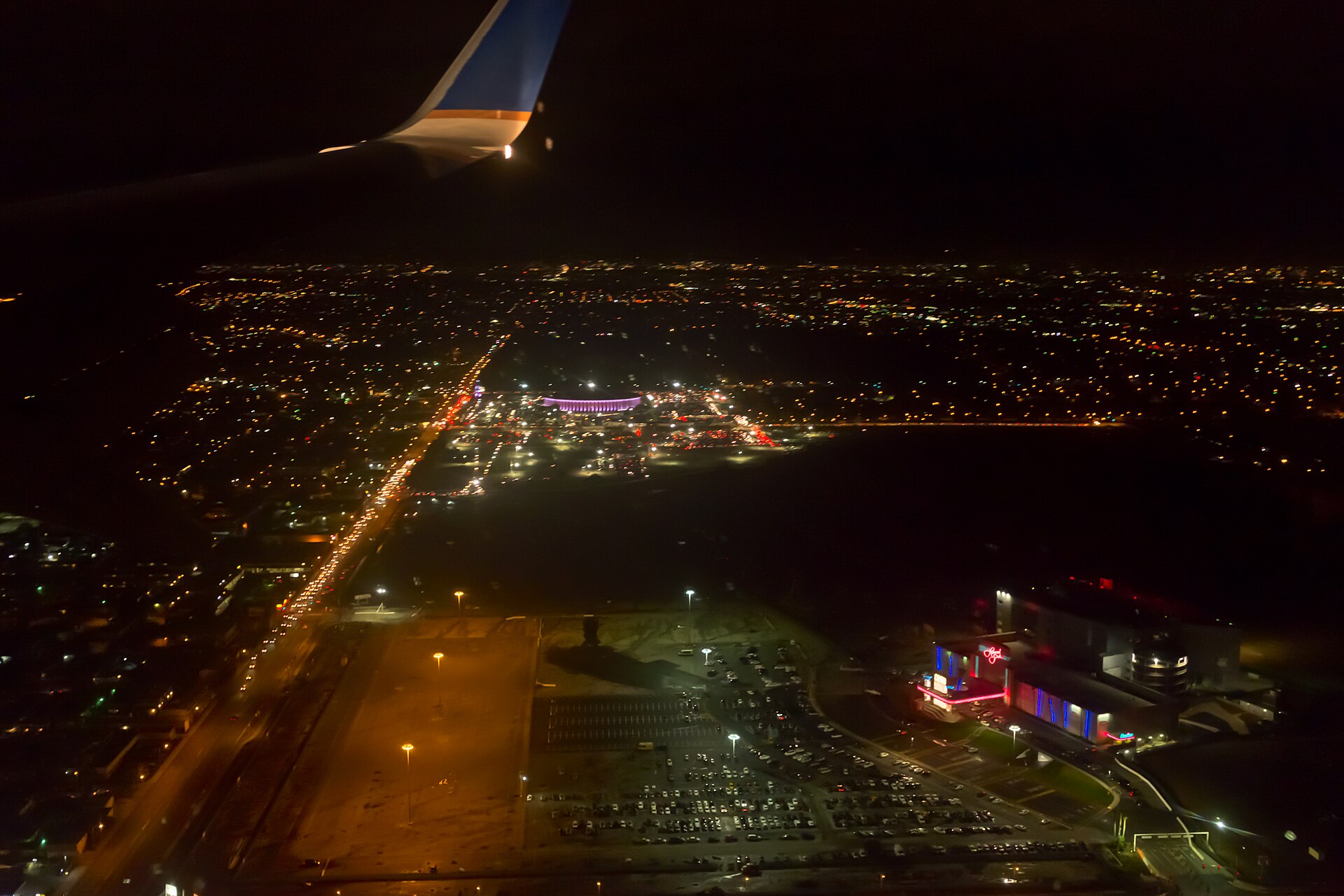The Kia Forum in Inglewood, California, lit up at night