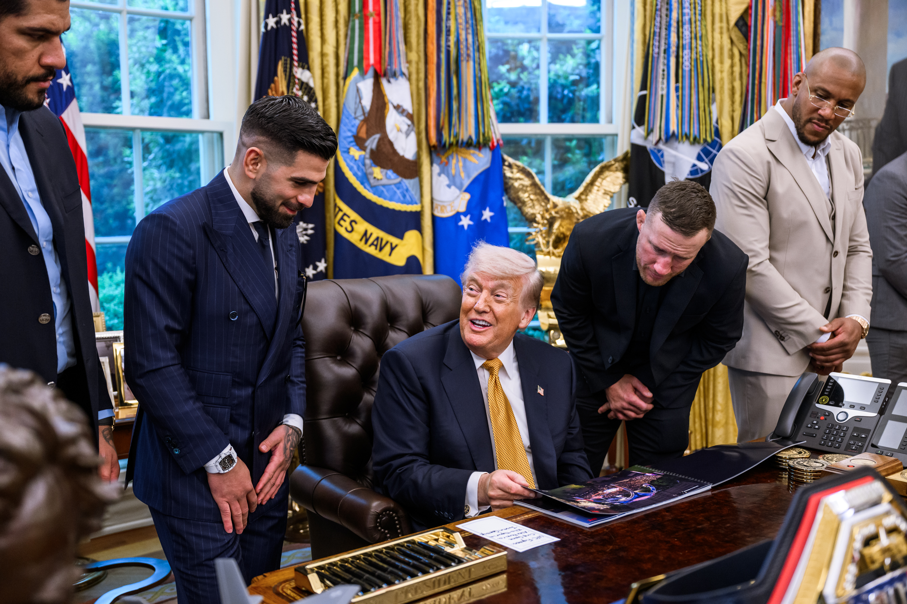 President Donald Trump in the Oval Office as the DNC sues Trump over taxpayer-funded ads.