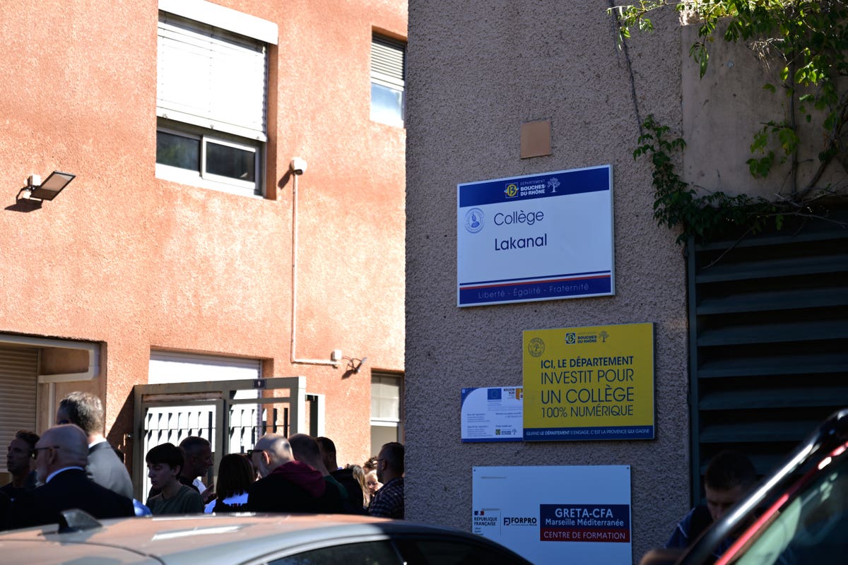 Police secure the street outside Joseph Lakanal middle school in Aubagne after the school shooting in France