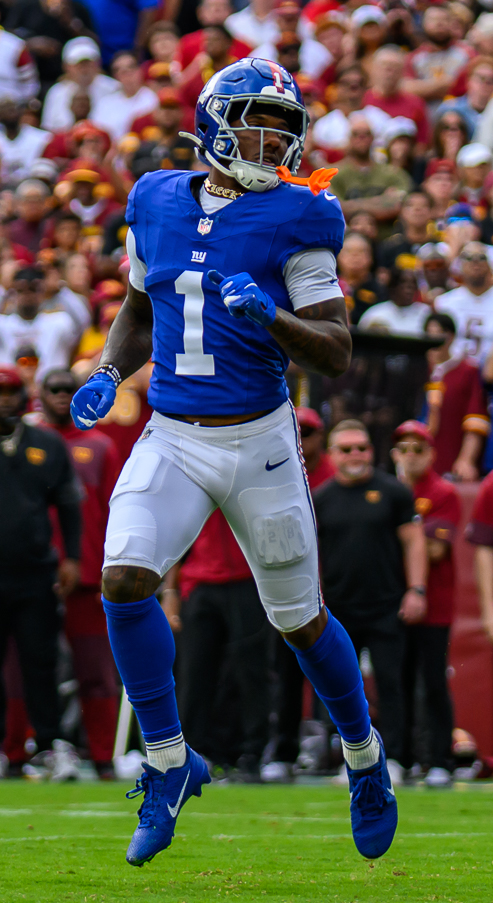 Malik Nabers in a Giants uniform, file photo — 11 catches for 121 yards in the 27-27 tie with Washington