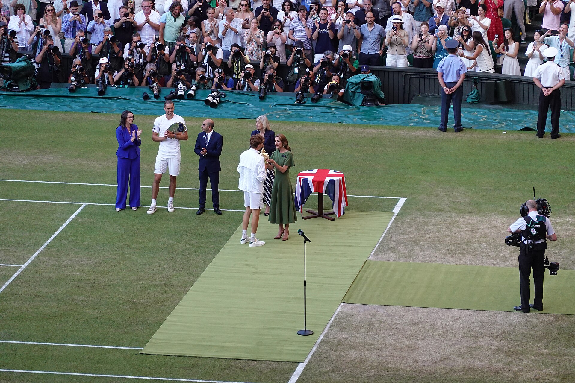 Catherine in grass green presenting the Wimbledon trophy — Kate Middleton best dressed 2026