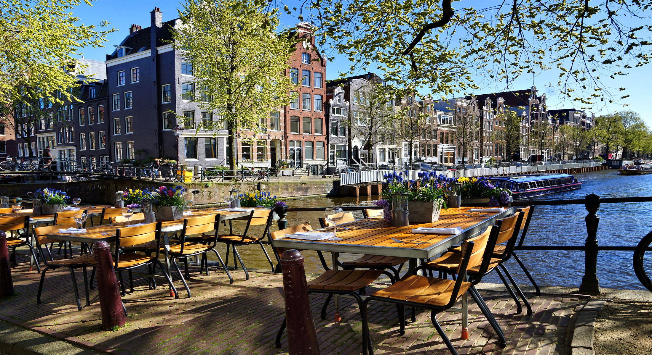 Canal-side restaurant terraces in Amsterdam