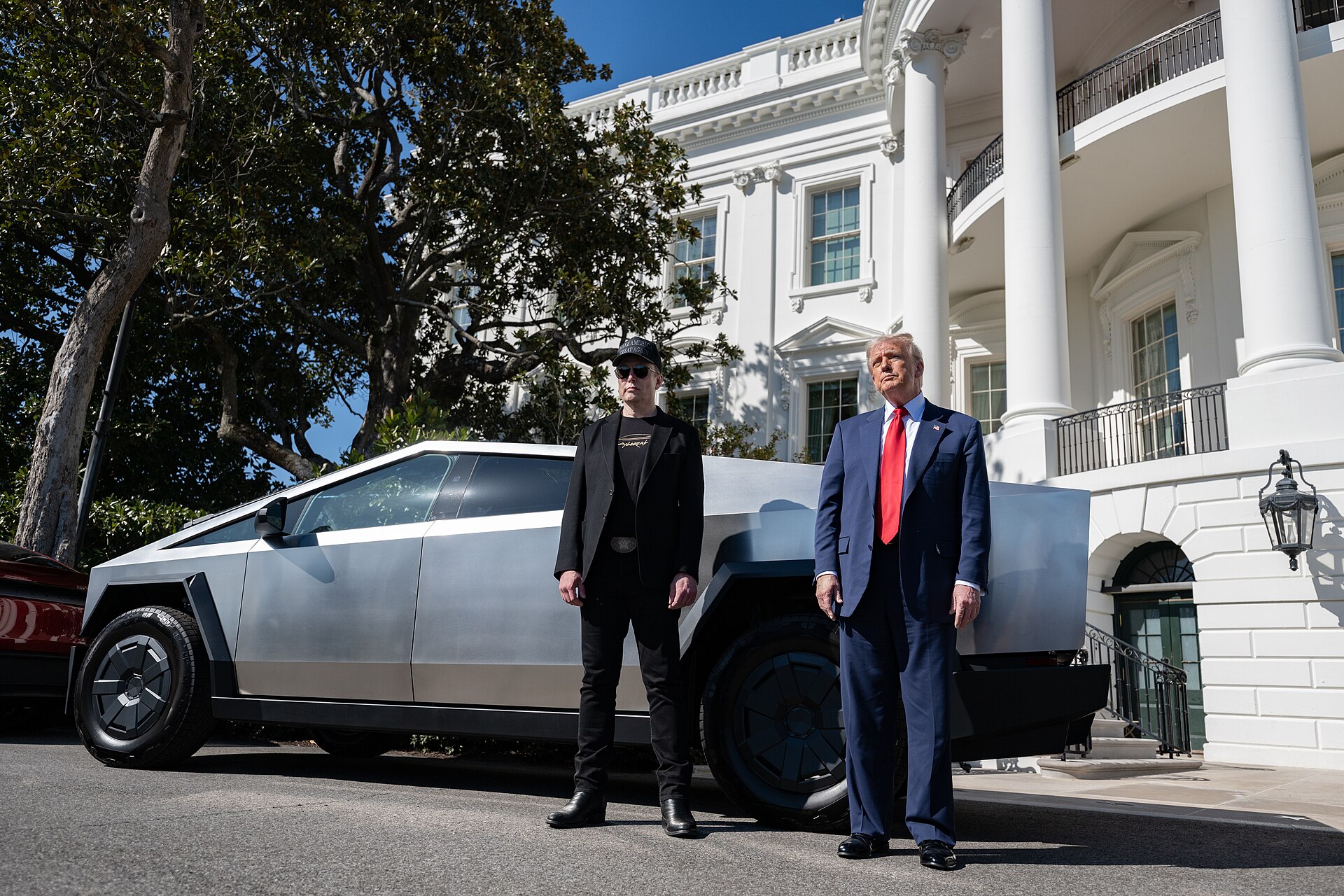 Elon Musk and President Donald Trump standing in front of a Tesla Cybertruck on the White House South Lawn in March 2025, Musk 366 million midterm spending