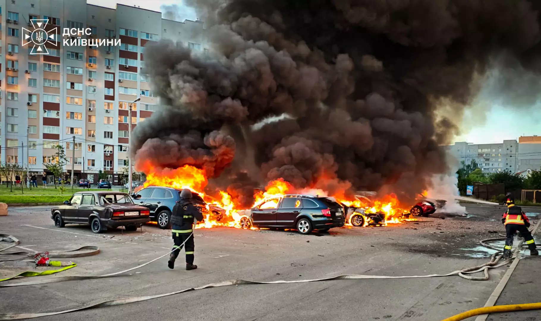 Firefighters tackling burning cars after drone strikes set warehouse buildings and vehicles ablaze in Vyshneve in the Kyiv region — Russia hits American businesses Ukraine file photo
