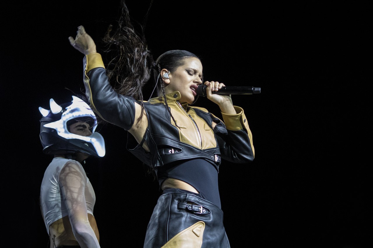 Rosalía performing onstage in Chile
