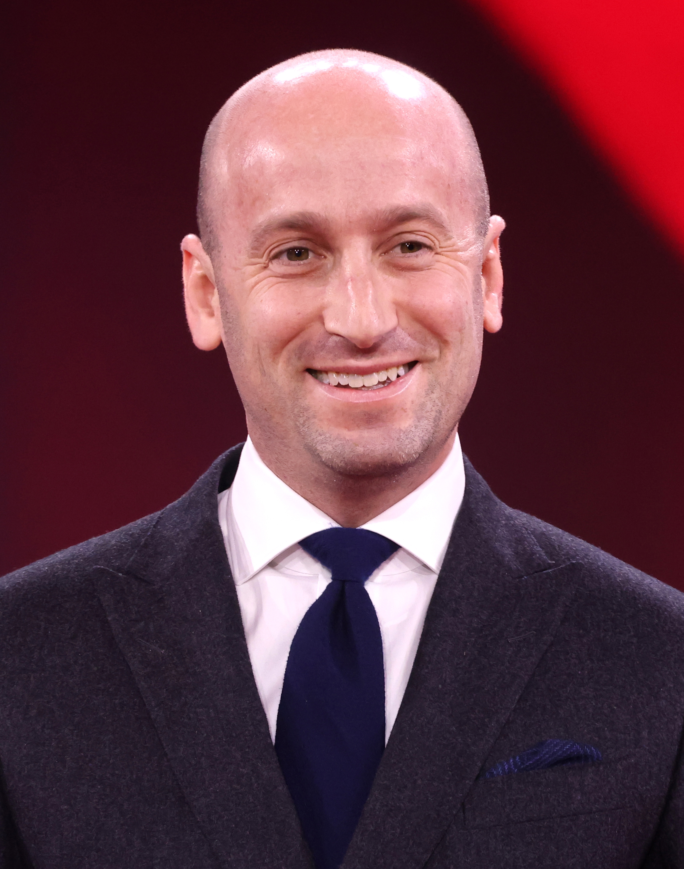 Portrait of Stephen Miller speaking at an event