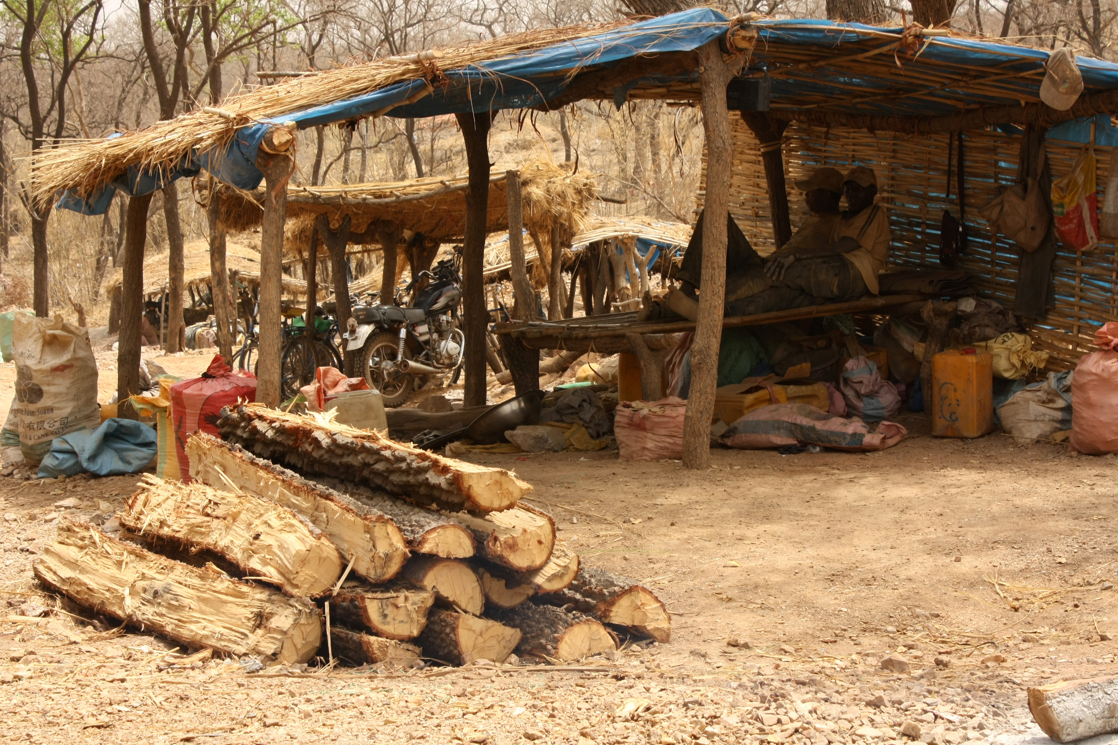 Artisanal gold miners at work in West Africa, representative of the makeshift mining sites struck in northern Sudan
