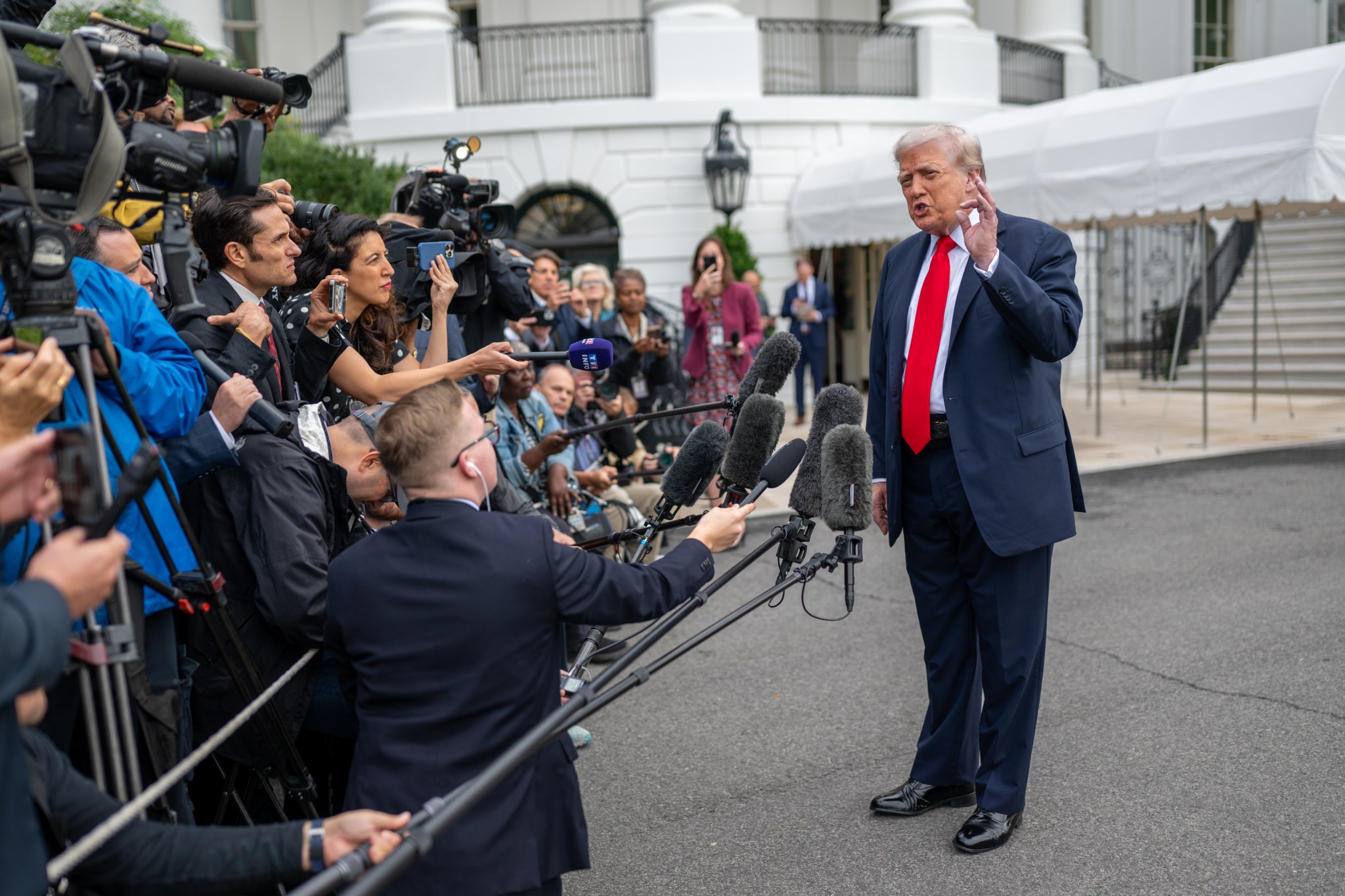 President Donald Trump speaking to reporters on the South Lawn before Marine One amid his call for a new Ukraine president