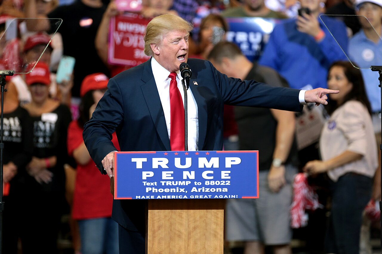 Donald Trump speaking at a campaign rally; he demanded 'eight' Nobel Peace Prize medals after the 2026 prize went to Navi Pillay