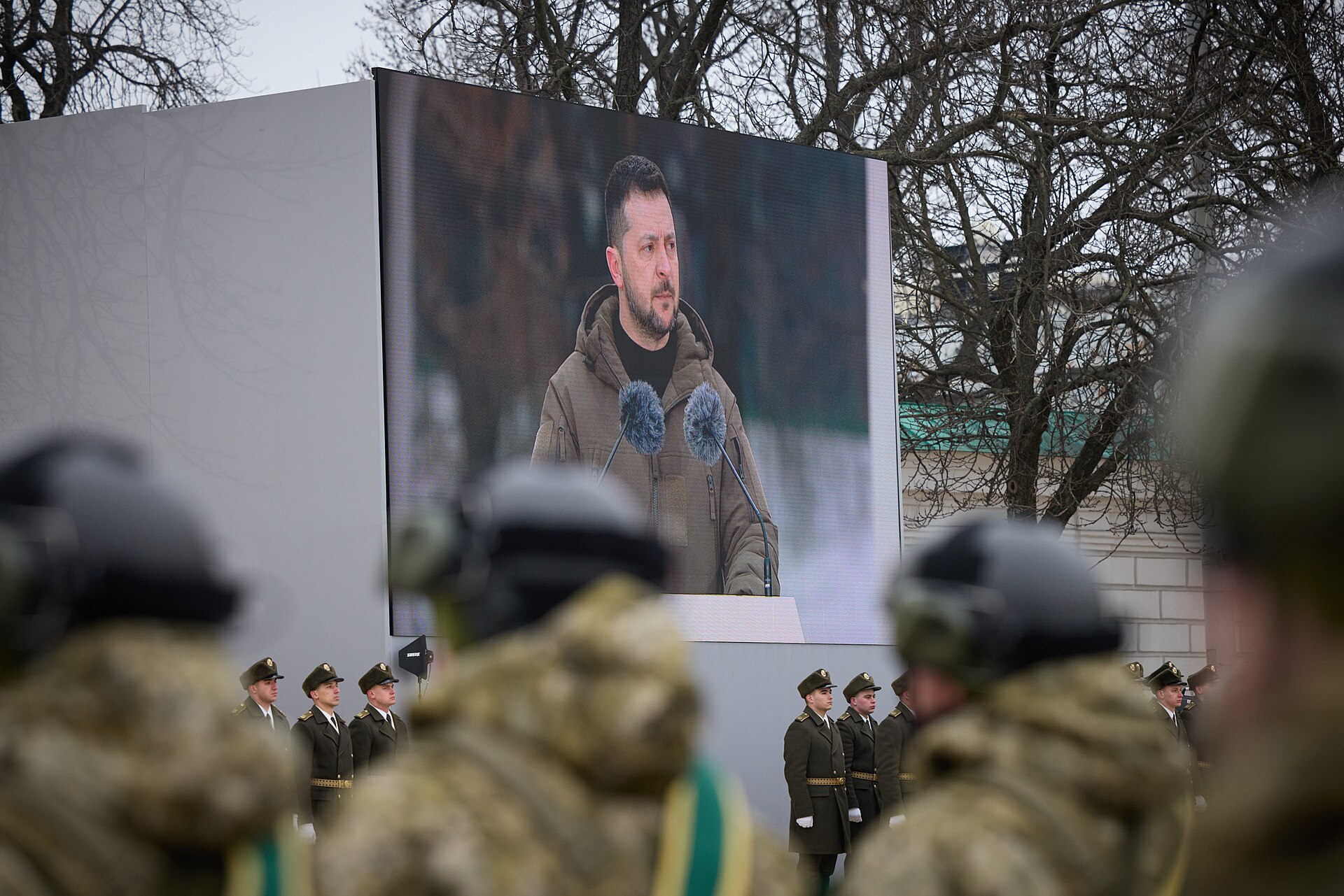 President Volodymyr Zelenskyy addressing Ukrainian troops on a screen at St Sophia's Square in Kyiv, Ukraine war day 1694