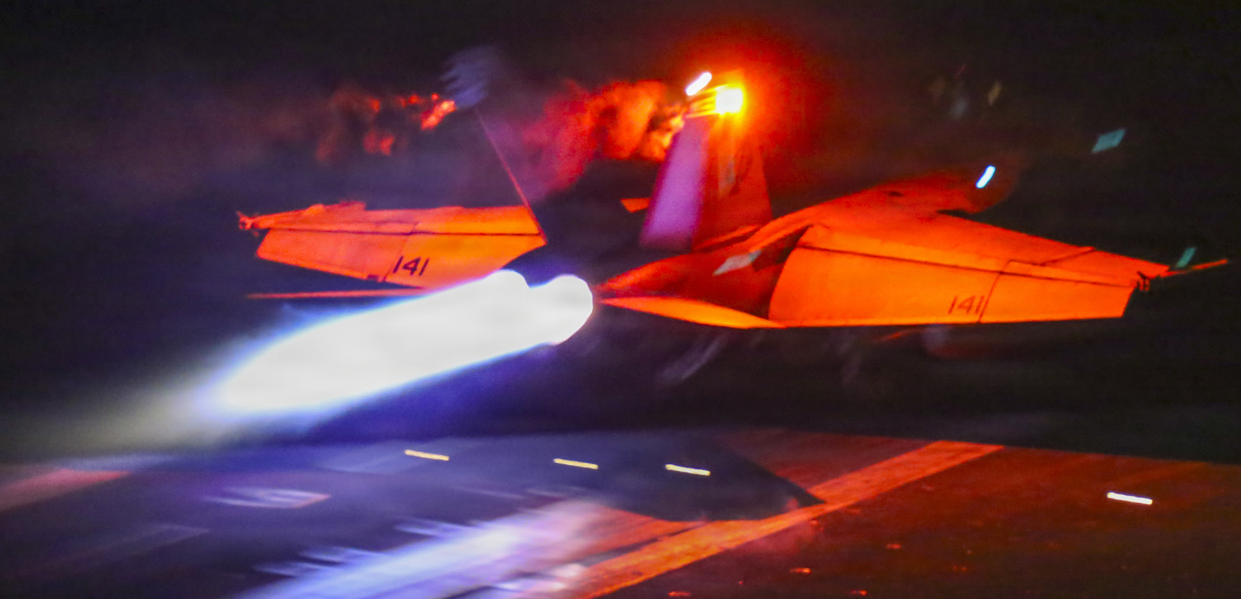 An F/A-18F Super Hornet takes off from USS Abraham Lincoln during Operation Epic Fury