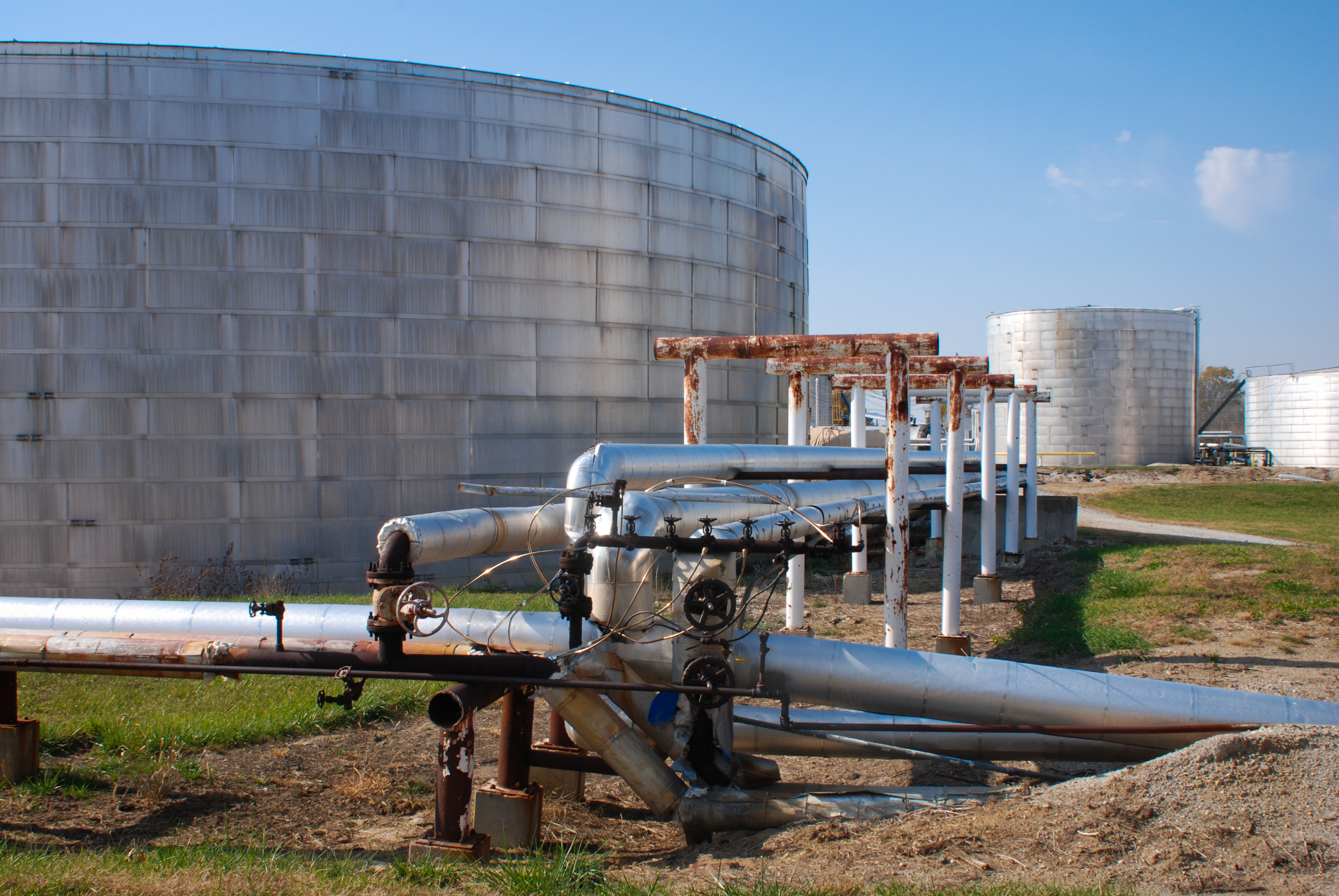 Storage tanks and pipes at an oil refinery