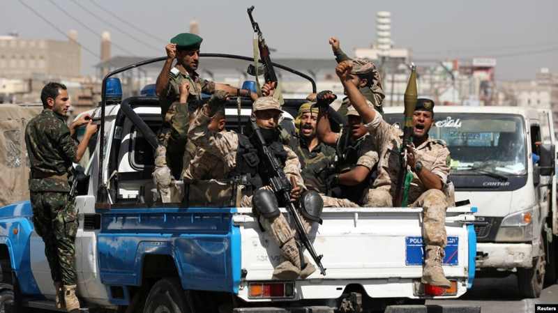 Houthi fighters in Yemen after a gathering; the group claimed Thursday's ballistic missile attack on Riyadh airport