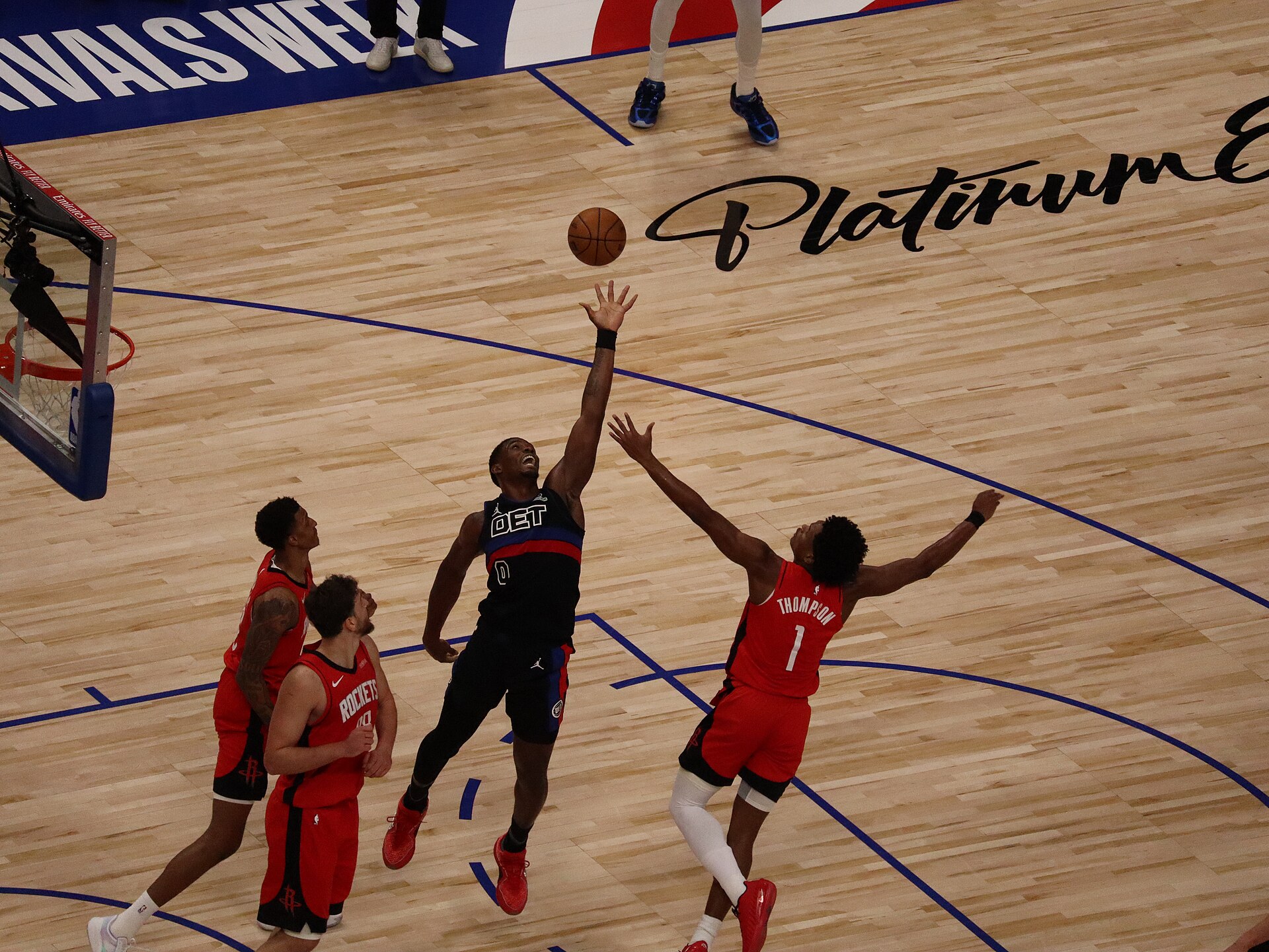 Pistons beat Heat 128-111 — Jalen Duren of the Detroit Pistons contesting a rebound in a Pistons uniform