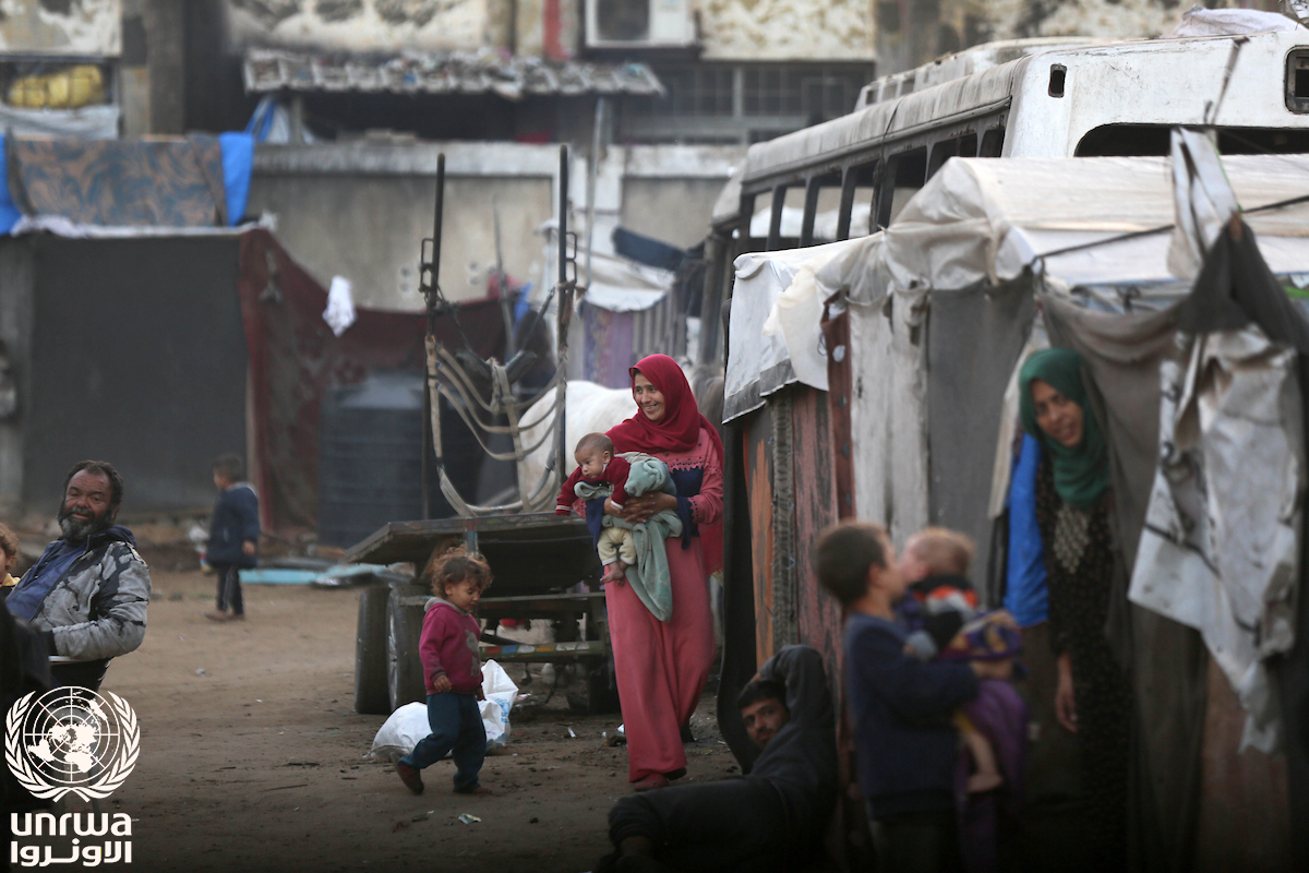 Displaced Palestinian families among tents and makeshift shelters in Deir el-Balah, central Gaza