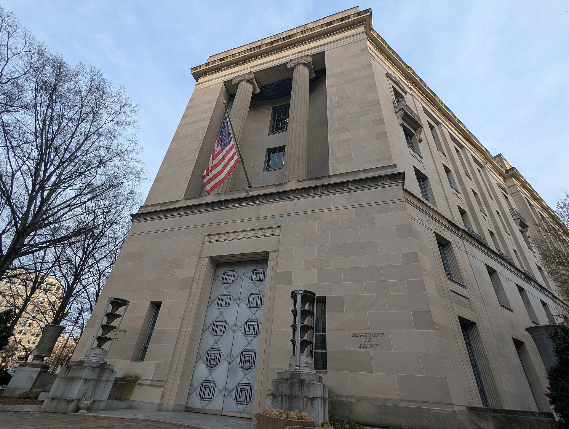 An exterior door of the Robert F. Kennedy Department of Justice Building in Washington — file photo
