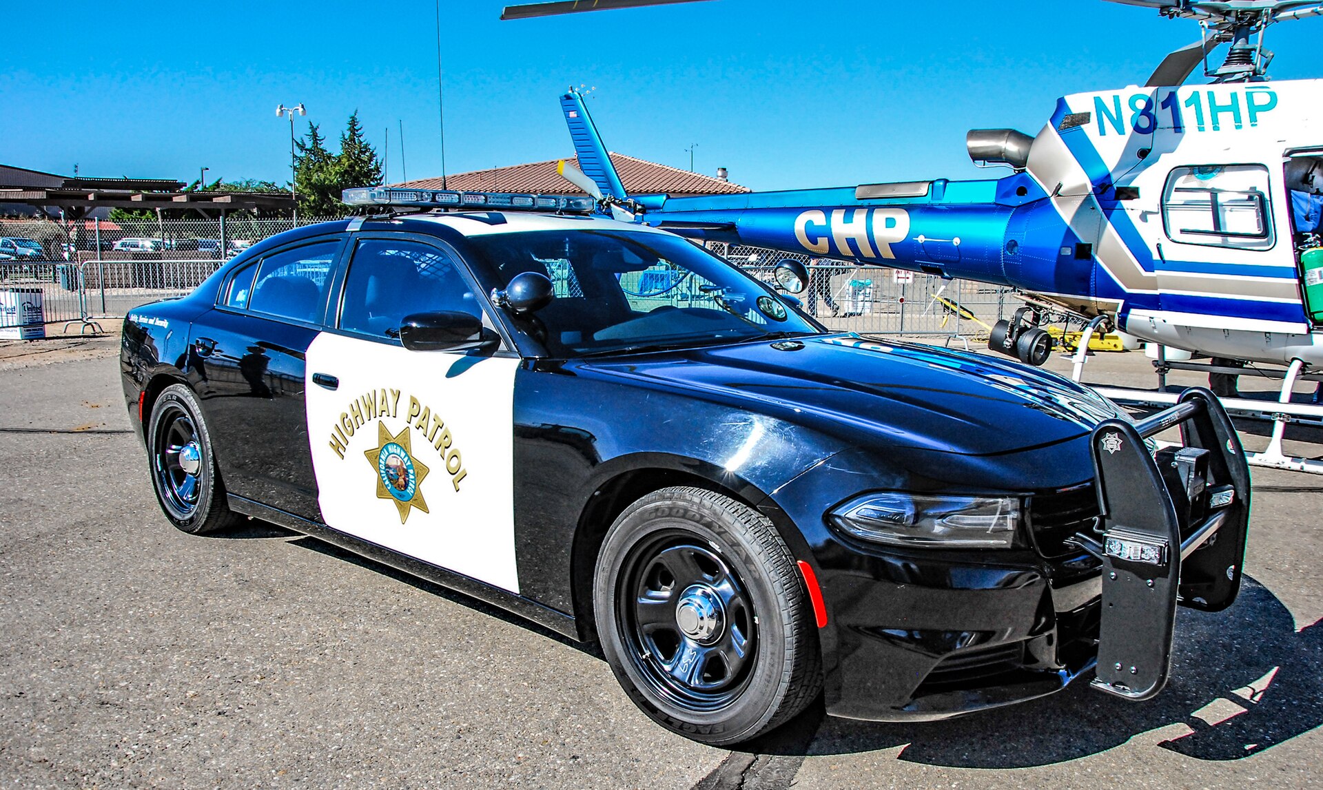 A California Highway Patrol Dodge Charger patrol car — CHP is investigating the body found on 22 freeway Santa Ana