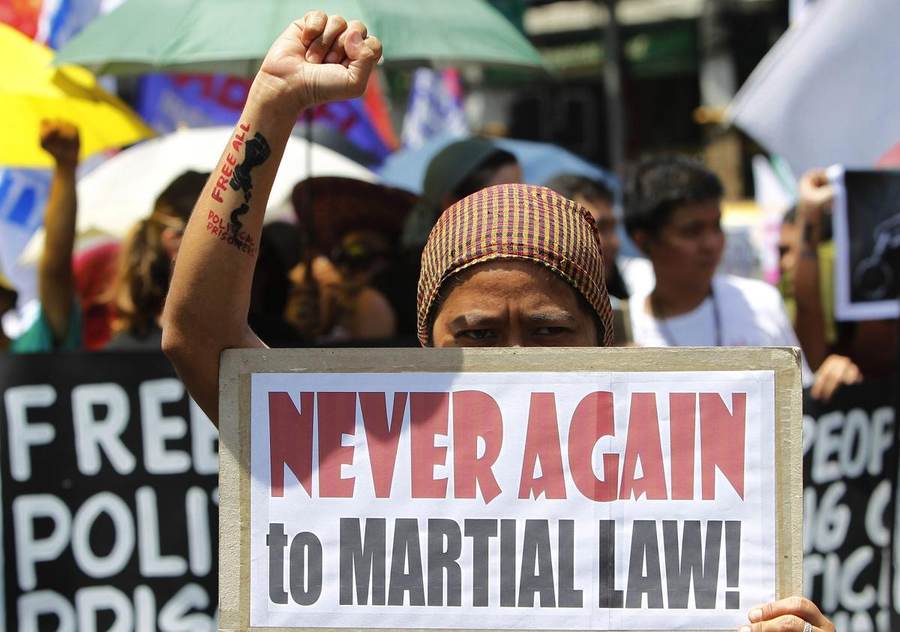 A protester at a Philippine martial-law anniversary rally