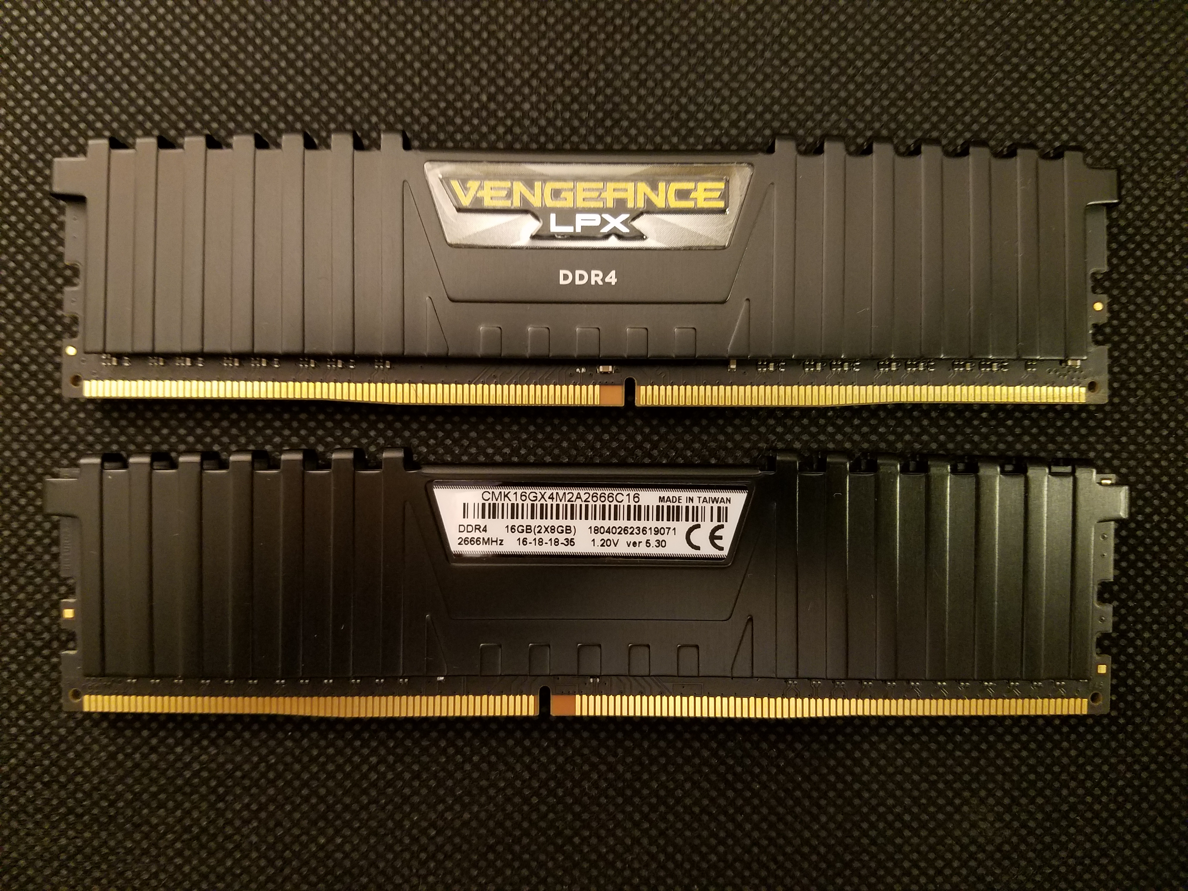 Two DDR4 memory modules held in a hand — file photo for the Dell memory chip shortage 2027 warning