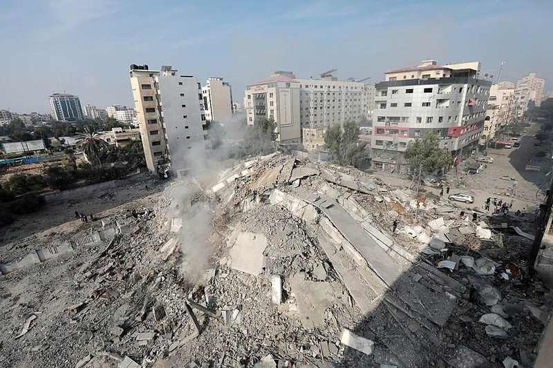 Collapsed residential building in Gaza, illustrating the rubble faced after a Rimal neighborhood airstrike