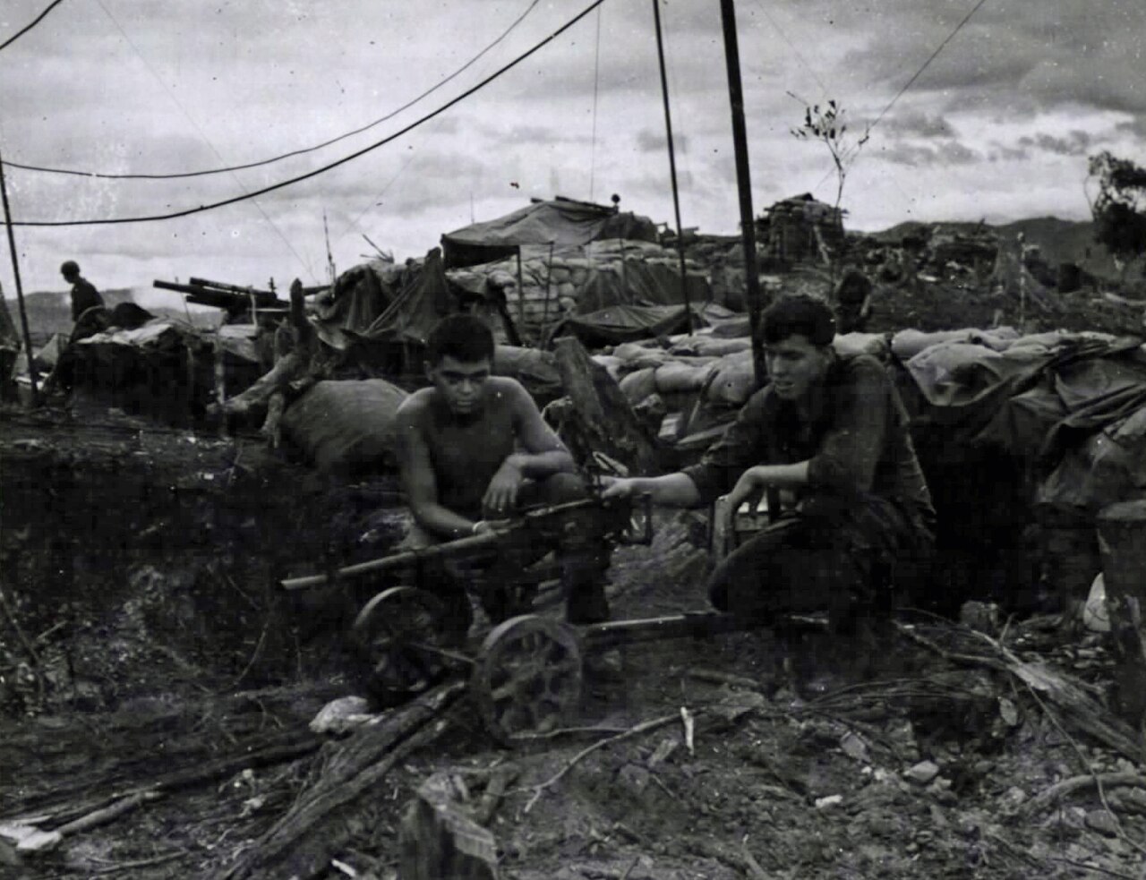 Soldiers of the U.S. Army 4th Infantry Division with a captured machine gun at Dak To in Vietnam, the division William Reaves served in as an infantry machine gunner