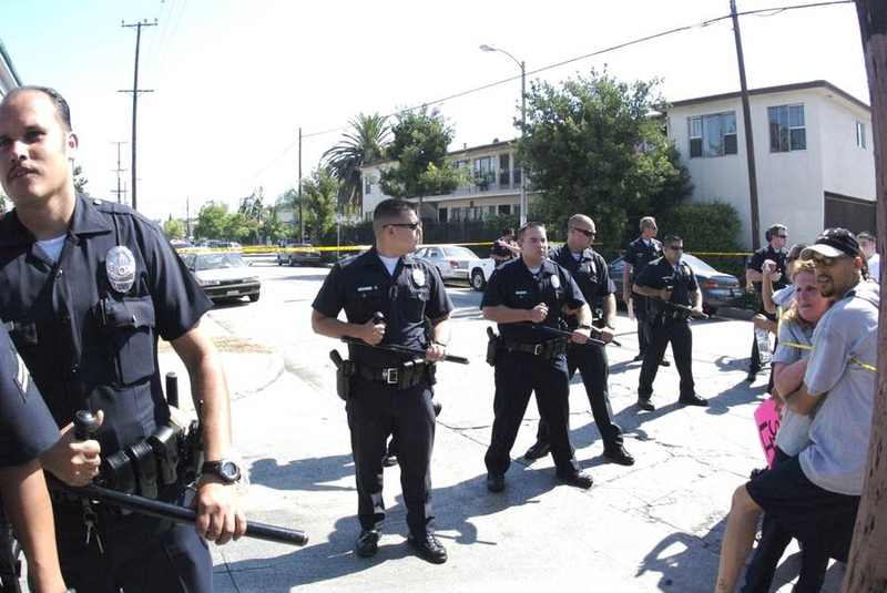 Los Angeles police officers at a crime scene — file photo related to the LAPD Northridge shooting investigation