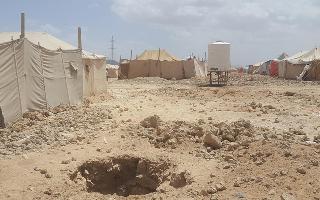 Tents in a desert displacement camp near Marib, Yemen, illustrating civilian flight from the war