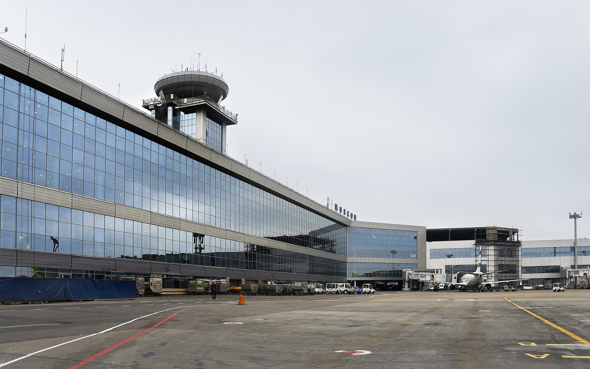 Moscow Domodedovo airport terminal and control tower — flights suspended during the overnight drone wave