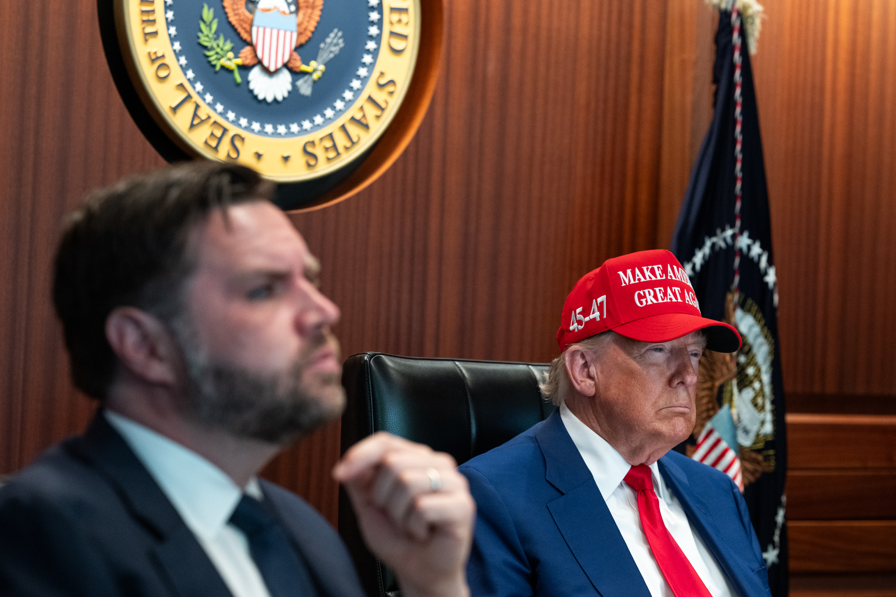 President Donald Trump in the White House Situation Room with Vice President JD Vance in the foreground, in an official White House photograph released during the 2025 U.S. strikes on Iran's nuclear sites