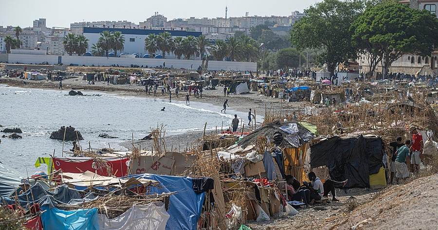 Tents and makeshift shelters at Trampolin beach Ceuta before Spain clears Ceuta migrant camp