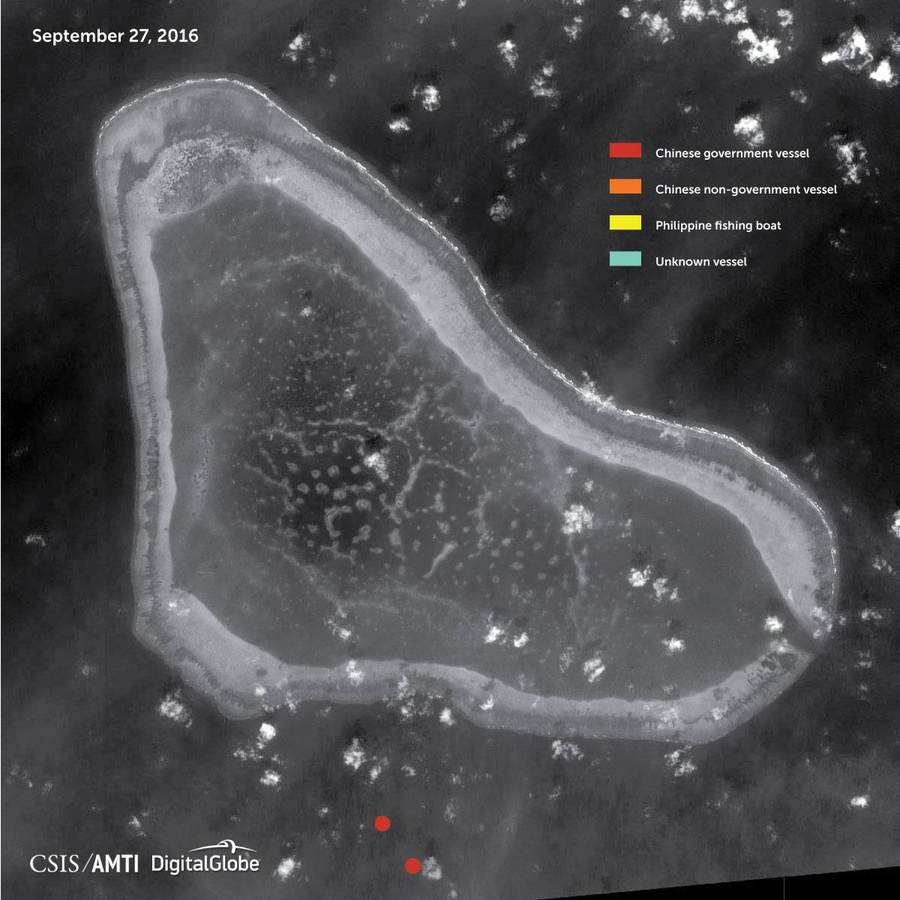 DigitalGlobe satellite image of Scarborough Shoal annotated by CSIS Asia Maritime Transparency Initiative showing Chinese government vessels, Chinese fishing boats, Philippine fishing boats and unidentified vessels