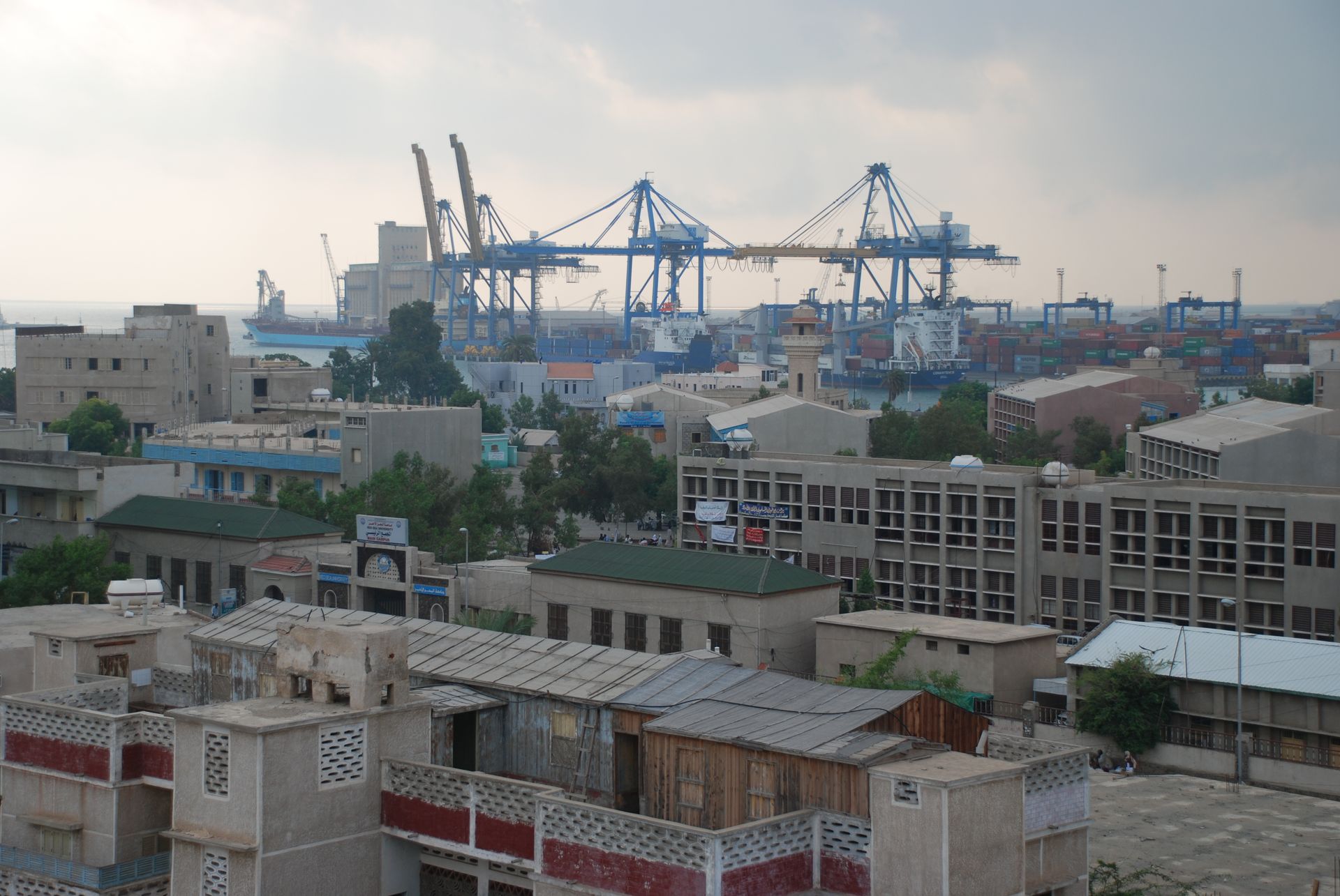 Port Sudan harbour and container cranes on the Red Sea, seen from the town centre — Burhan offered Russia a free economic zone on this coast