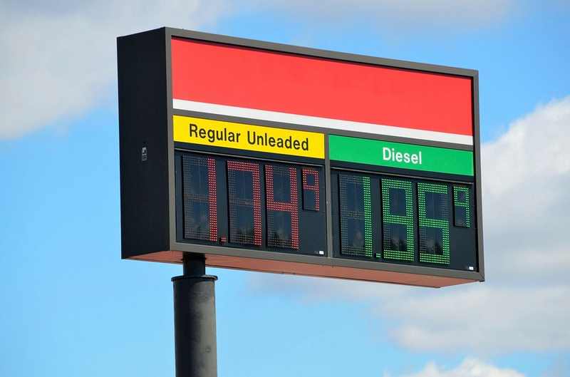 Gas-station fuel price sign illustrating Trump's gasoline-price explanation for the Los Angeles remark