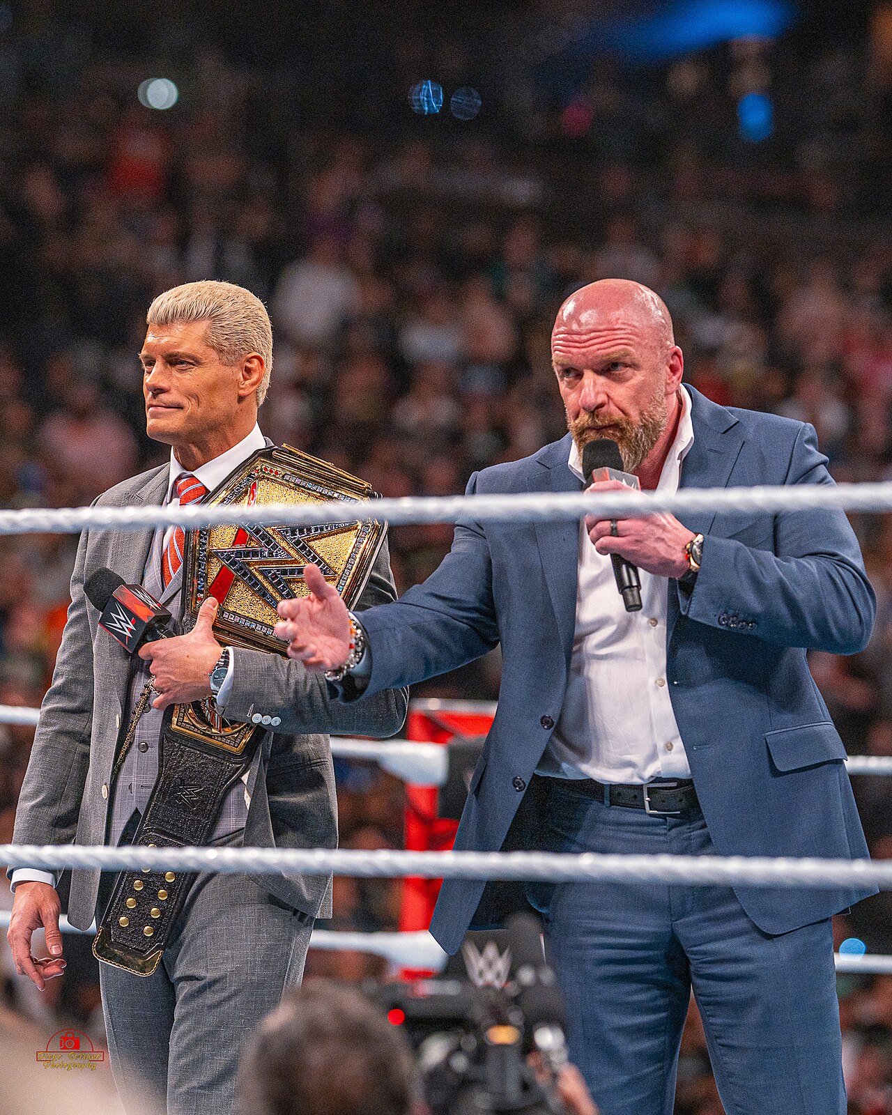 Cody Rhodes vs Randy Orton Crown Jewel — Cody Rhodes holding the WWE Championship alongside Triple H at the Raw after WrestleMania XL