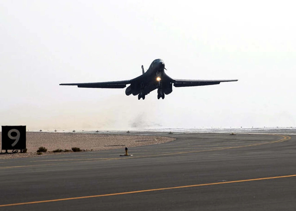 A U.S. Air Force B-1B Lancer takes off from a runway on a long-range mission.