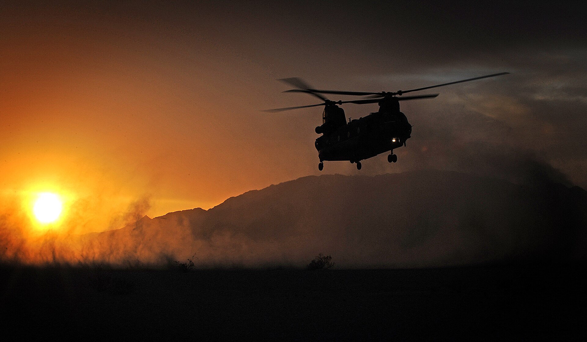 An RAF Chinook helicopter in flight — Britain military aircraft wildfires plan will equip Chinooks to drop water on blazes for the first time