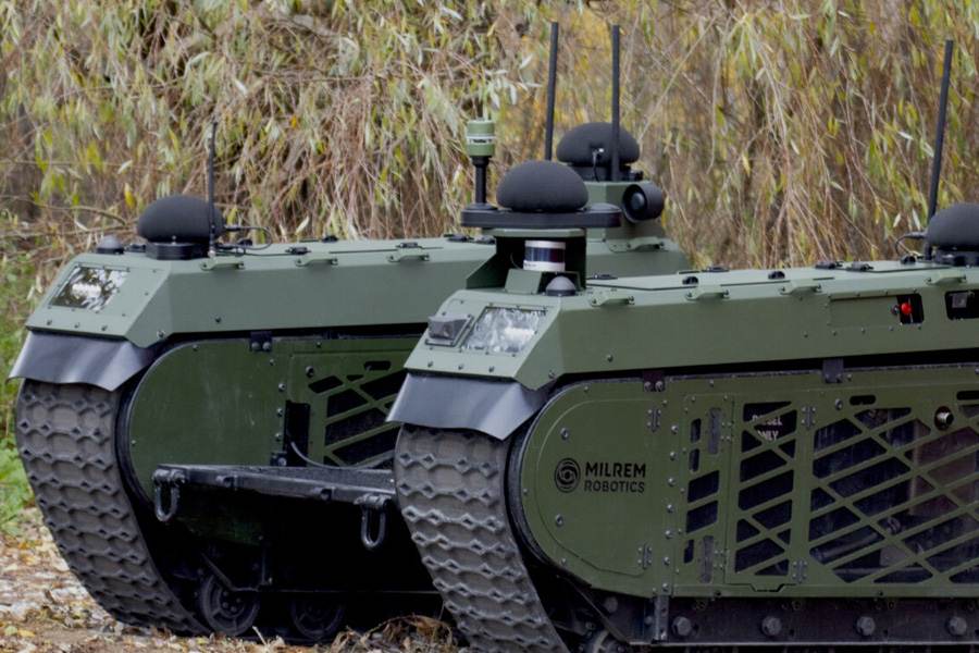A military-green Milrem Robotics THeMIS unmanned ground vehicle in the field &mdash; the tracked robotic platform is used by Ukrainian forces for casualty evacuation and resupply