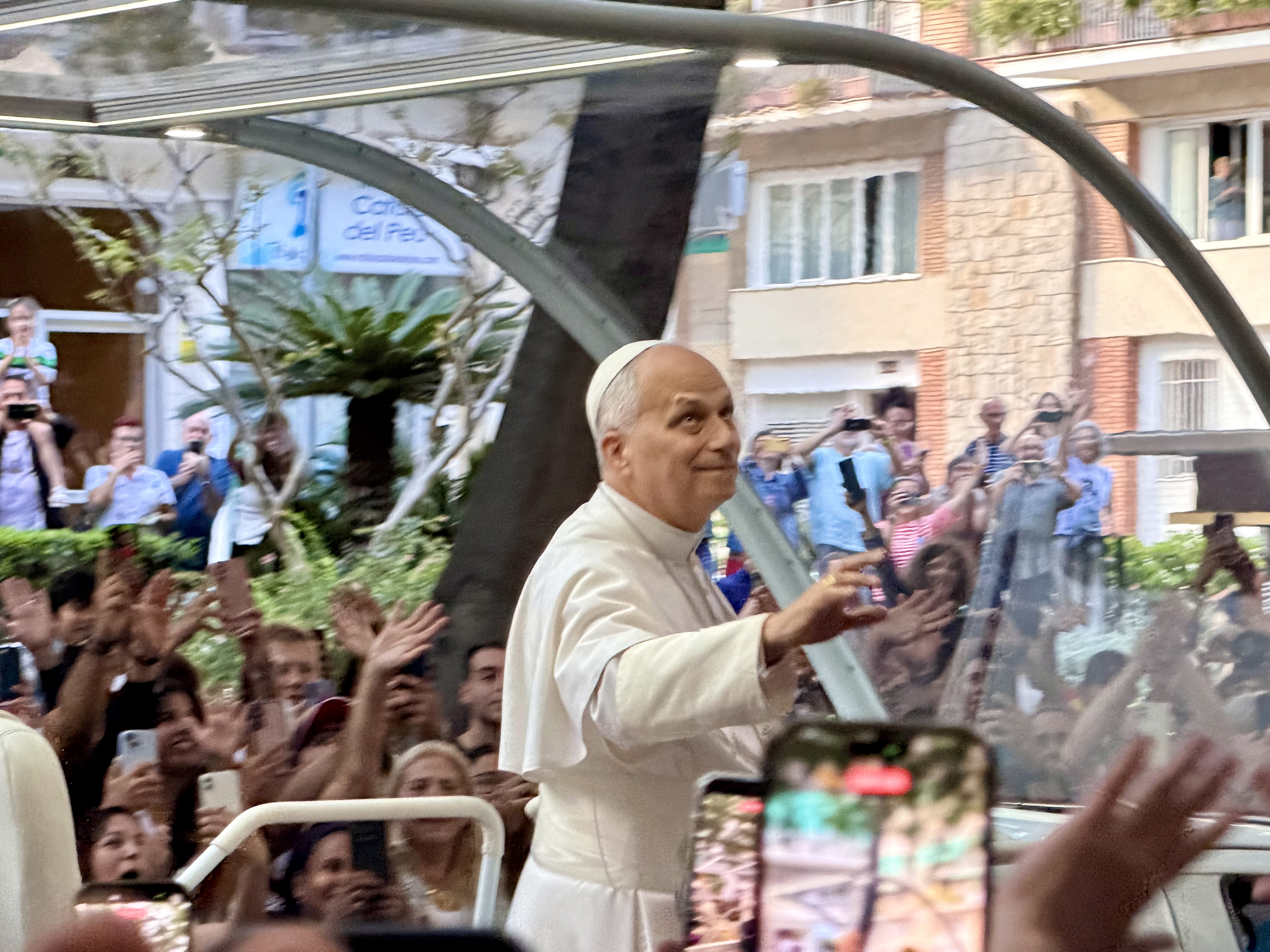 Pope Leo XIV greeting crowds from the popemobile during his apostolic visit to Spain, June 2026