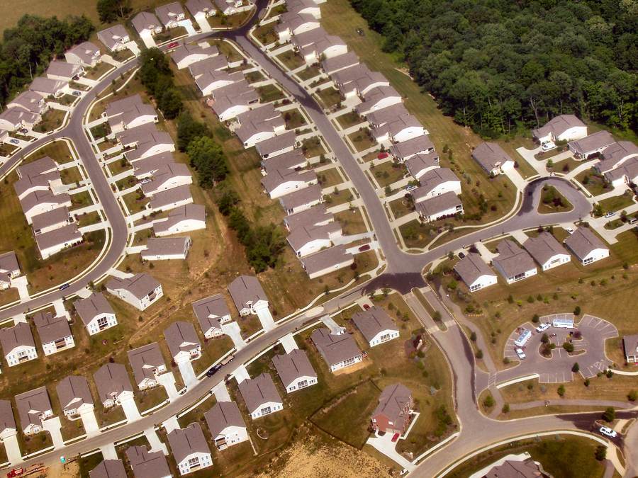 aerial view of suburban tract housing amid the 2026 housing market freeze