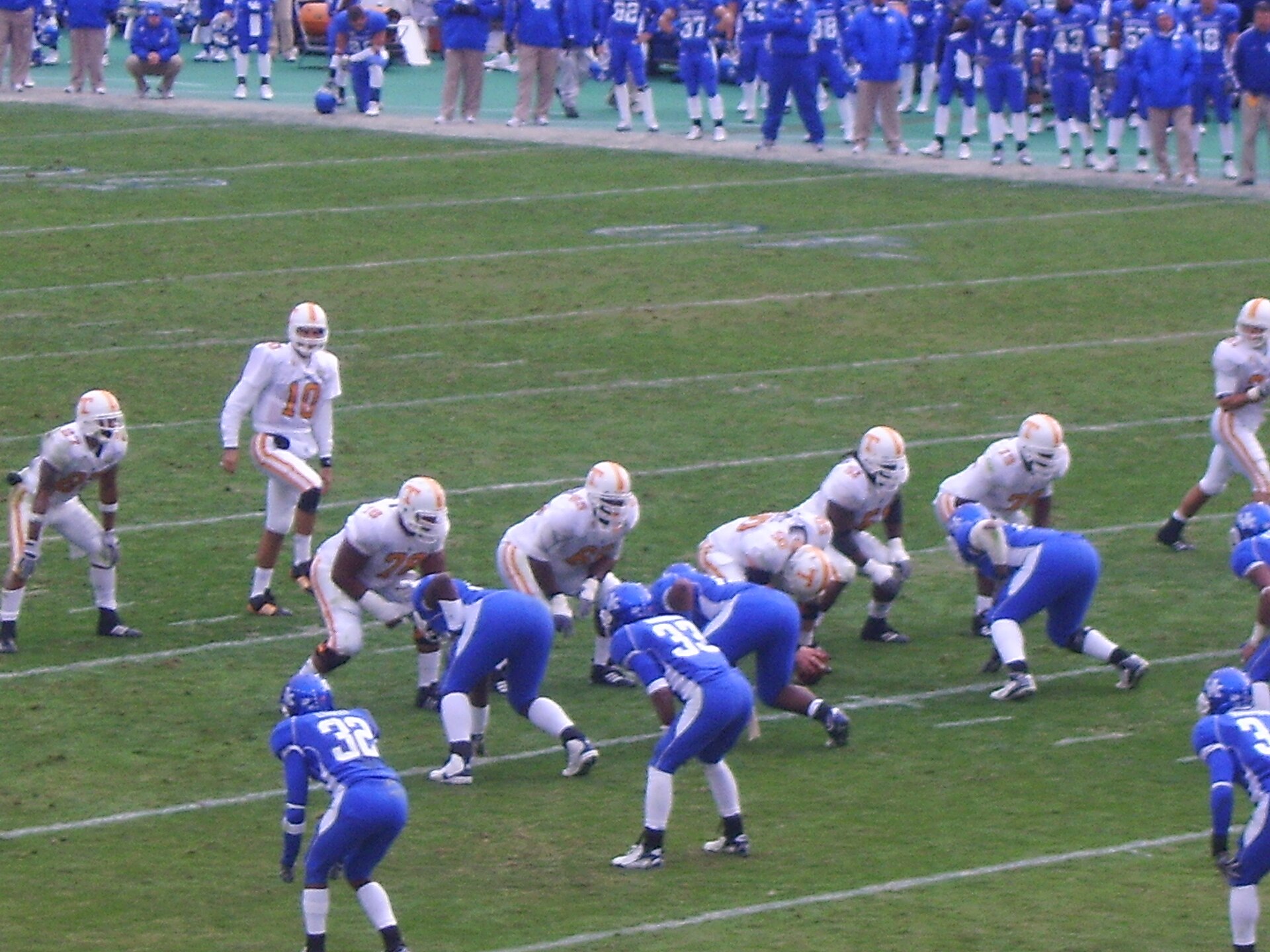 Tennessee in white against Kentucky in blue at the line of scrimmage, previewing Kentucky's next game at Tennessee on November 7