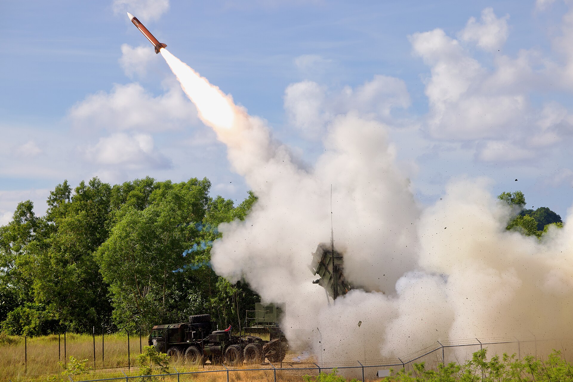 A US Army Patriot missile-defense battery firing an interceptor during a live-fire exercise — the Patriot battery Israel Texas deployment Washington is now repeating