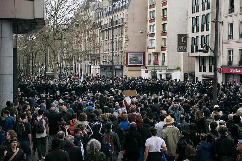 French police face student protesters as France suspends police stun grenades