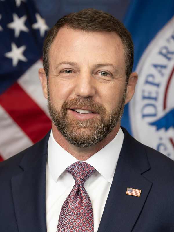 Homeland Security Secretary Markwayne Mullin official DHS portrait — Mullin rips Mamdani over the Bronx ICE shooting
