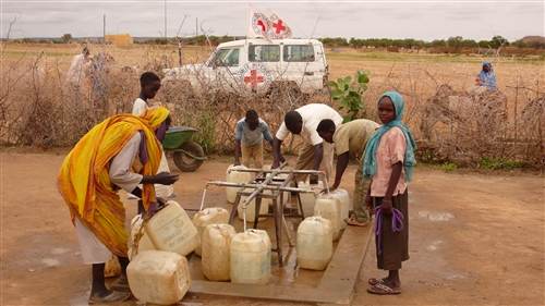 Sudan cholera funding crisis and clean water point in North Darfur