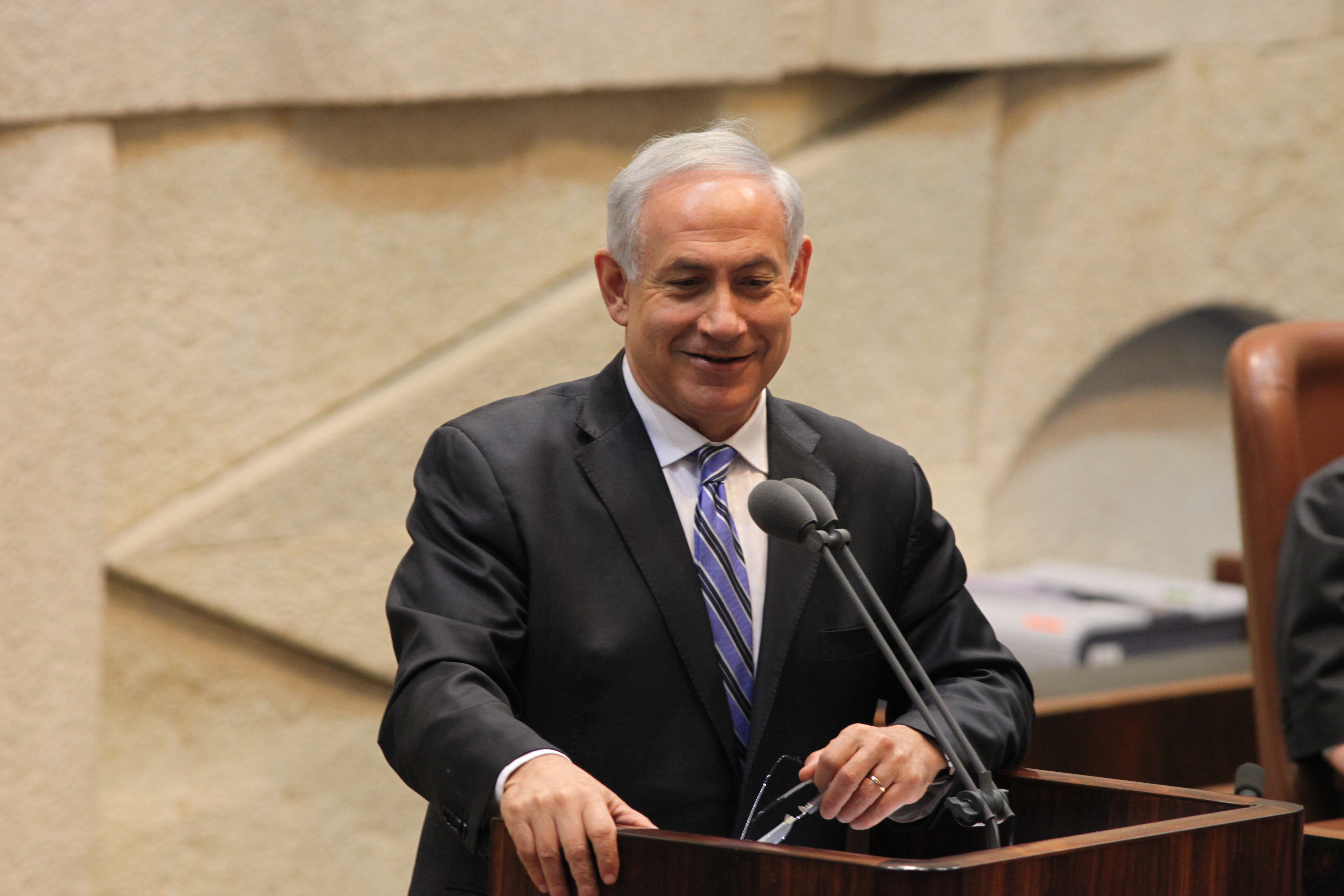 Benjamin Netanyahu in the Knesset — the Israel election exit polls 2026 keep his Likud first but strip his bloc of its majority