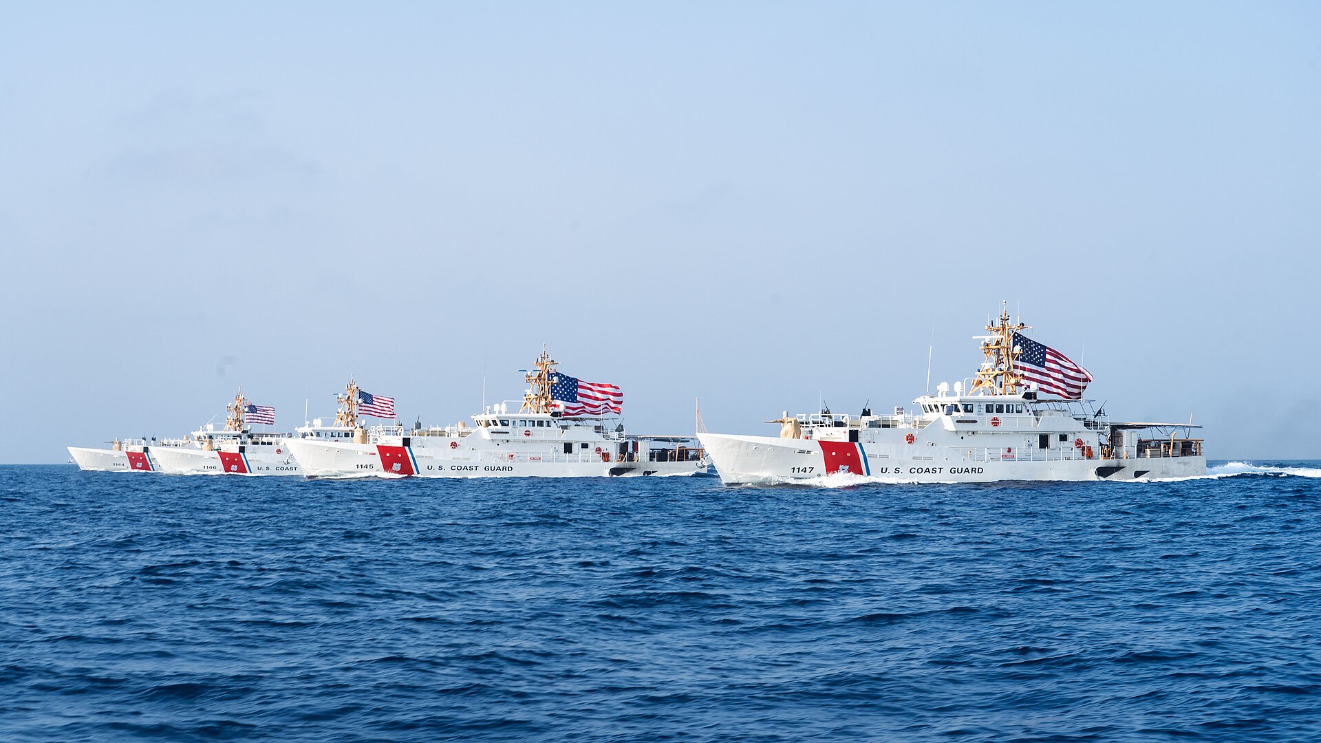 US Coast Guard Sentinel-class cutters sailing in formation in the Strait of Hormuz